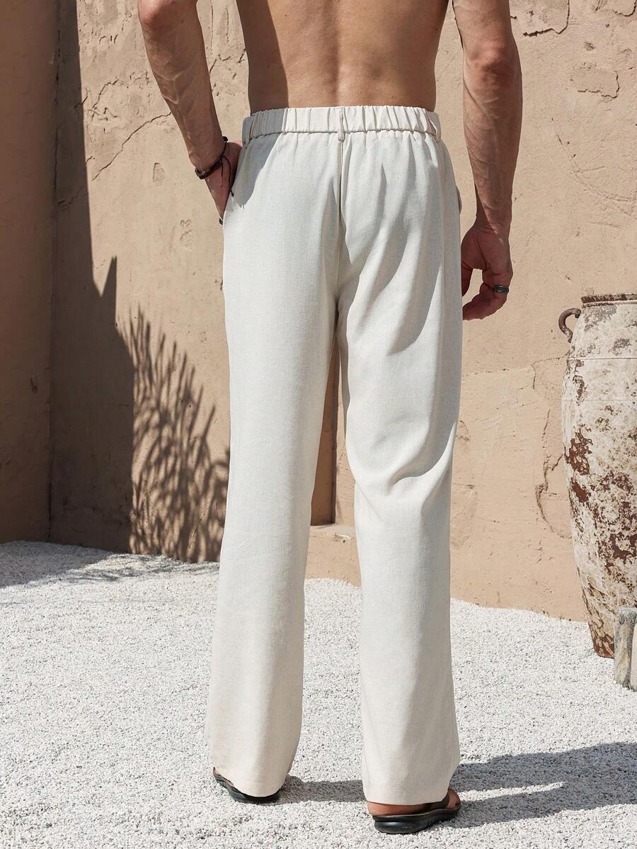 PANTALONI IN LINO CON TASCHE