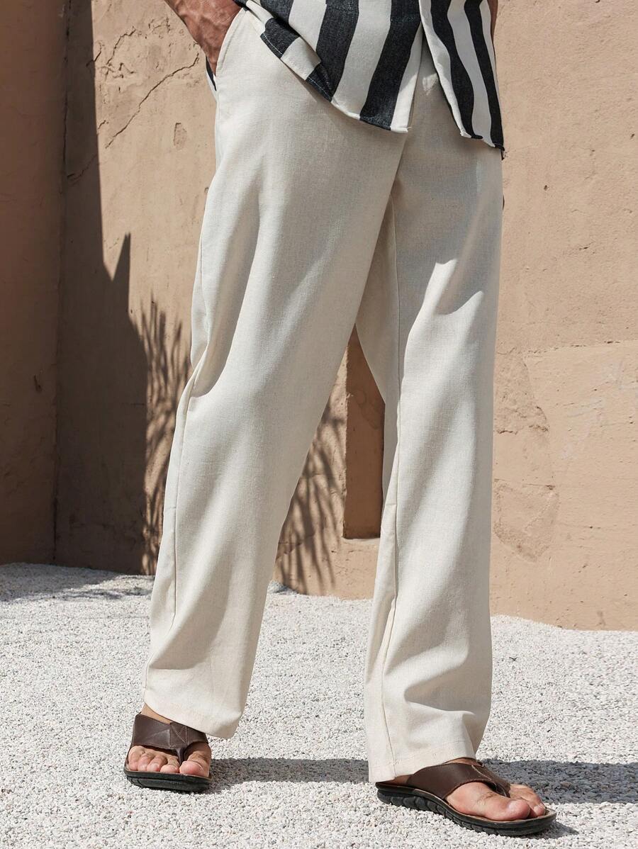 PANTALONI IN LINO CON TASCHE