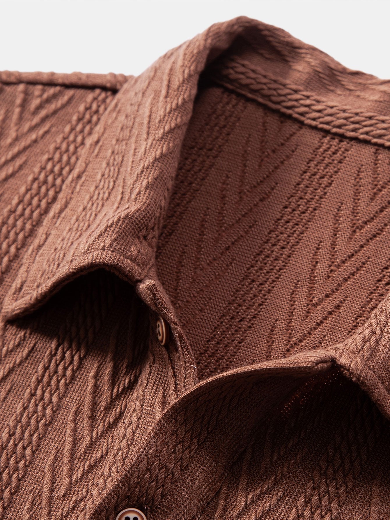 POLO IN JACQUARD GEOMETRICO LAVORATO A MAGLIA