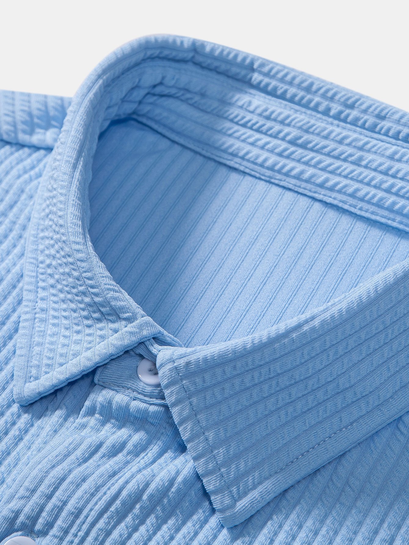 CAMICIA MUSCLE FIT A COSTE CON BOTTONI