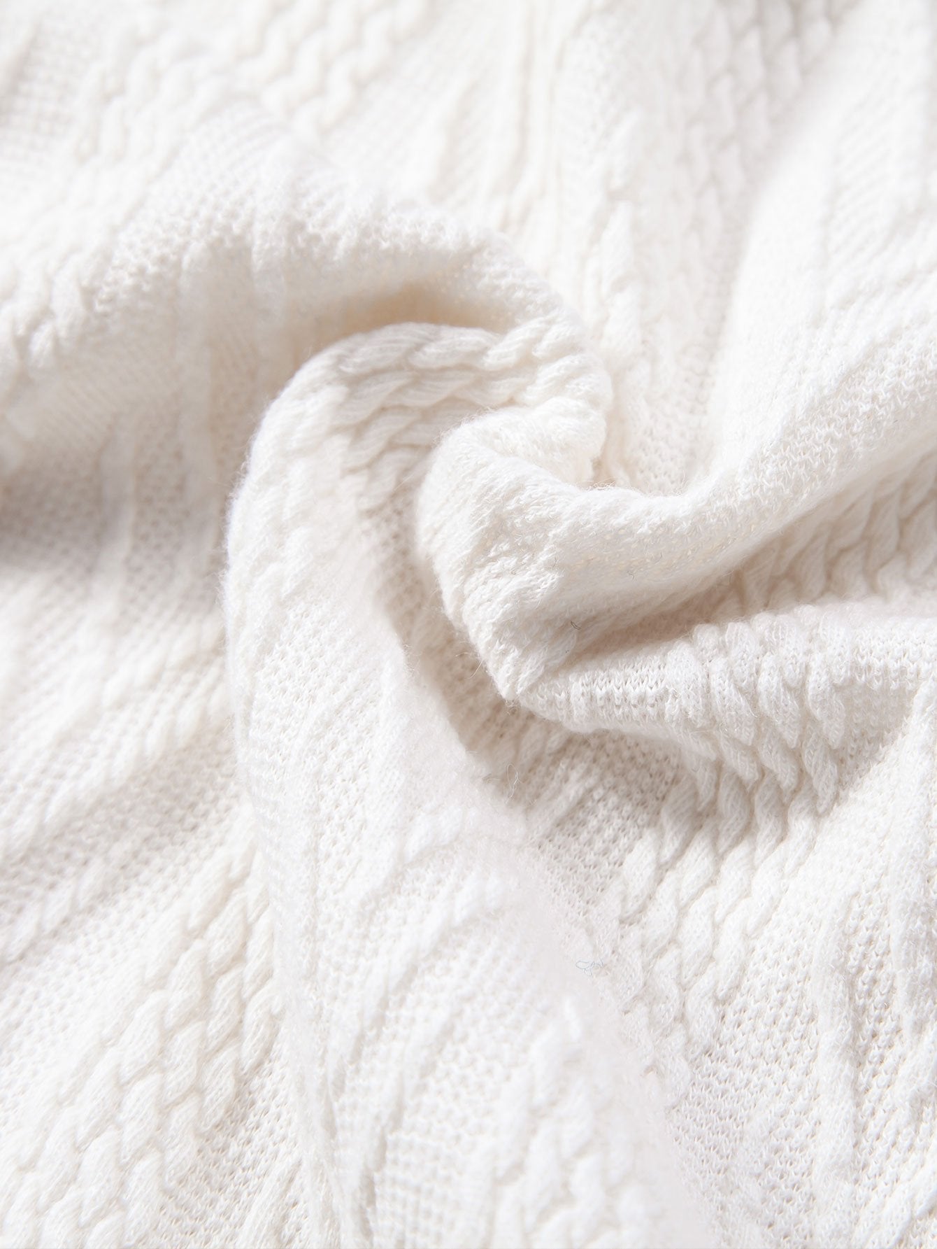 POLO IN JACQUARD GEOMETRICO LAVORATO A MAGLIA