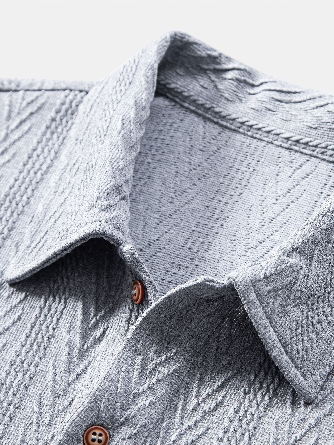 POLO IN JACQUARD GEOMETRICO LAVORATO A MAGLIA