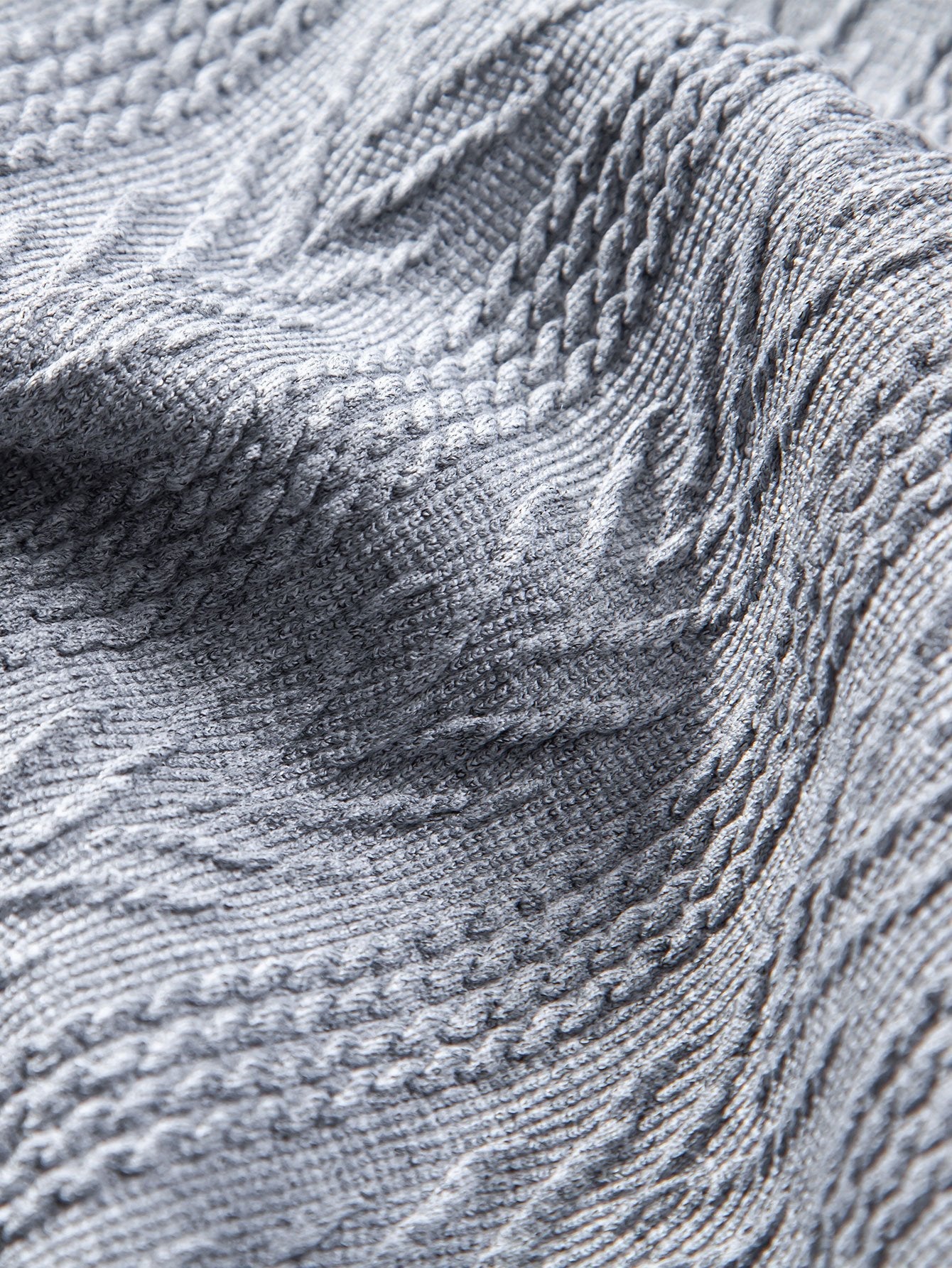 POLO IN JACQUARD GEOMETRICO LAVORATO A MAGLIA