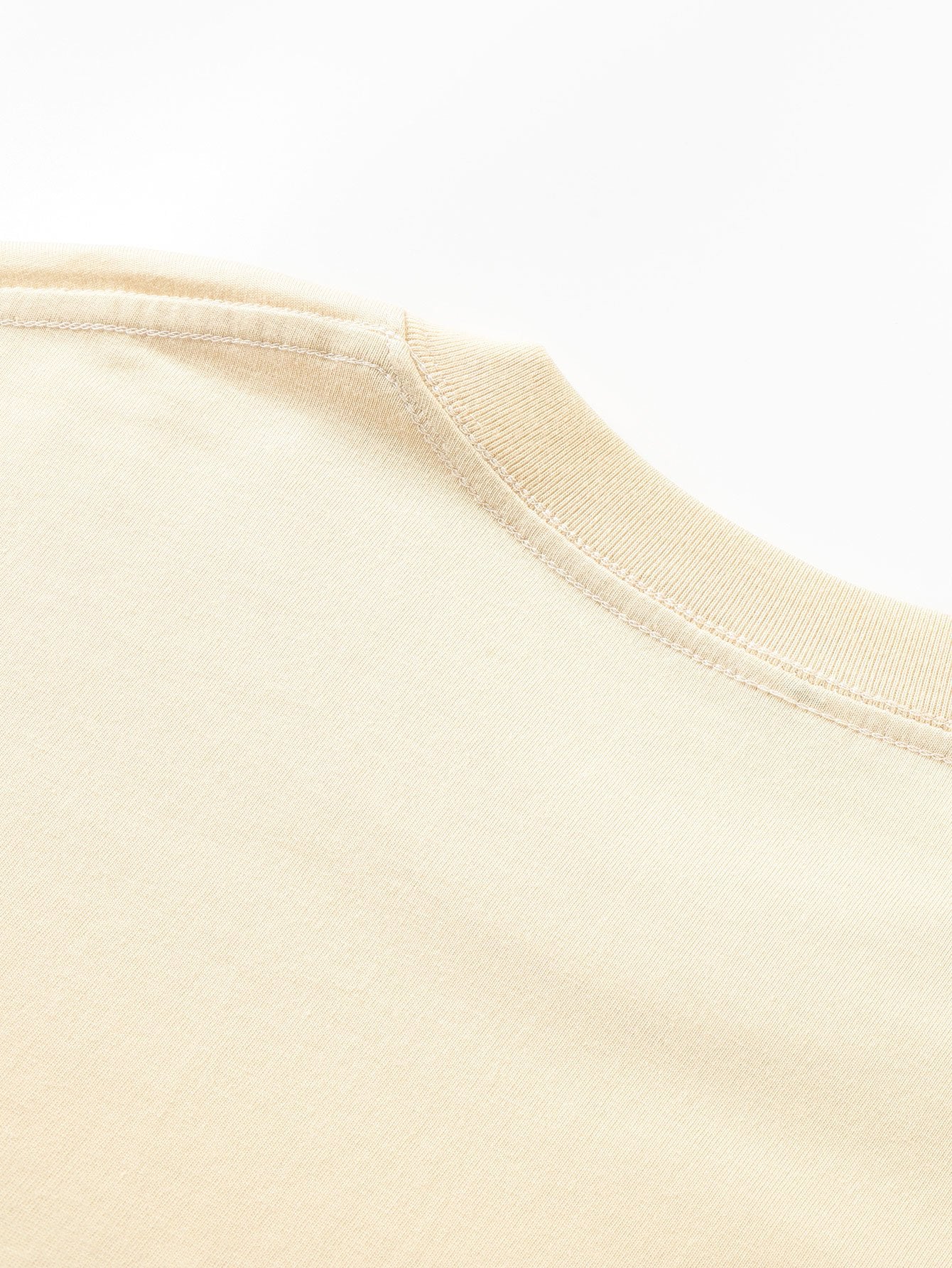 T-SHIRT A MANICHE LUNGHE PESANTE CON ORLO CURVO