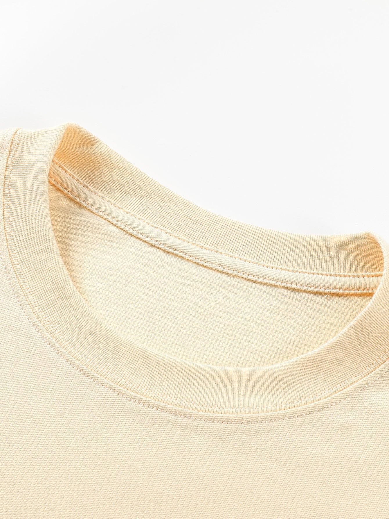 T-SHIRT A MANICHE LUNGHE PESANTE CON ORLO CURVO