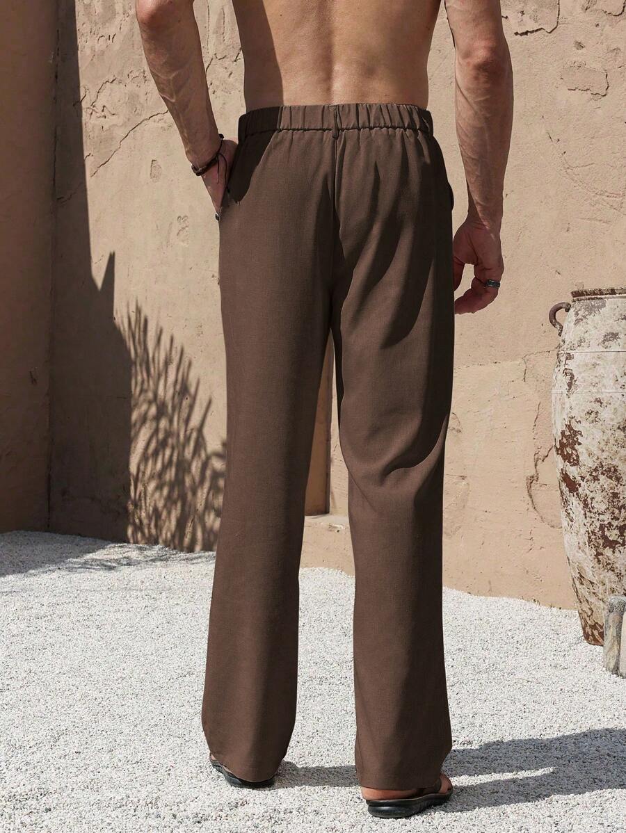 PANTALONI IN LINO CON TASCHE