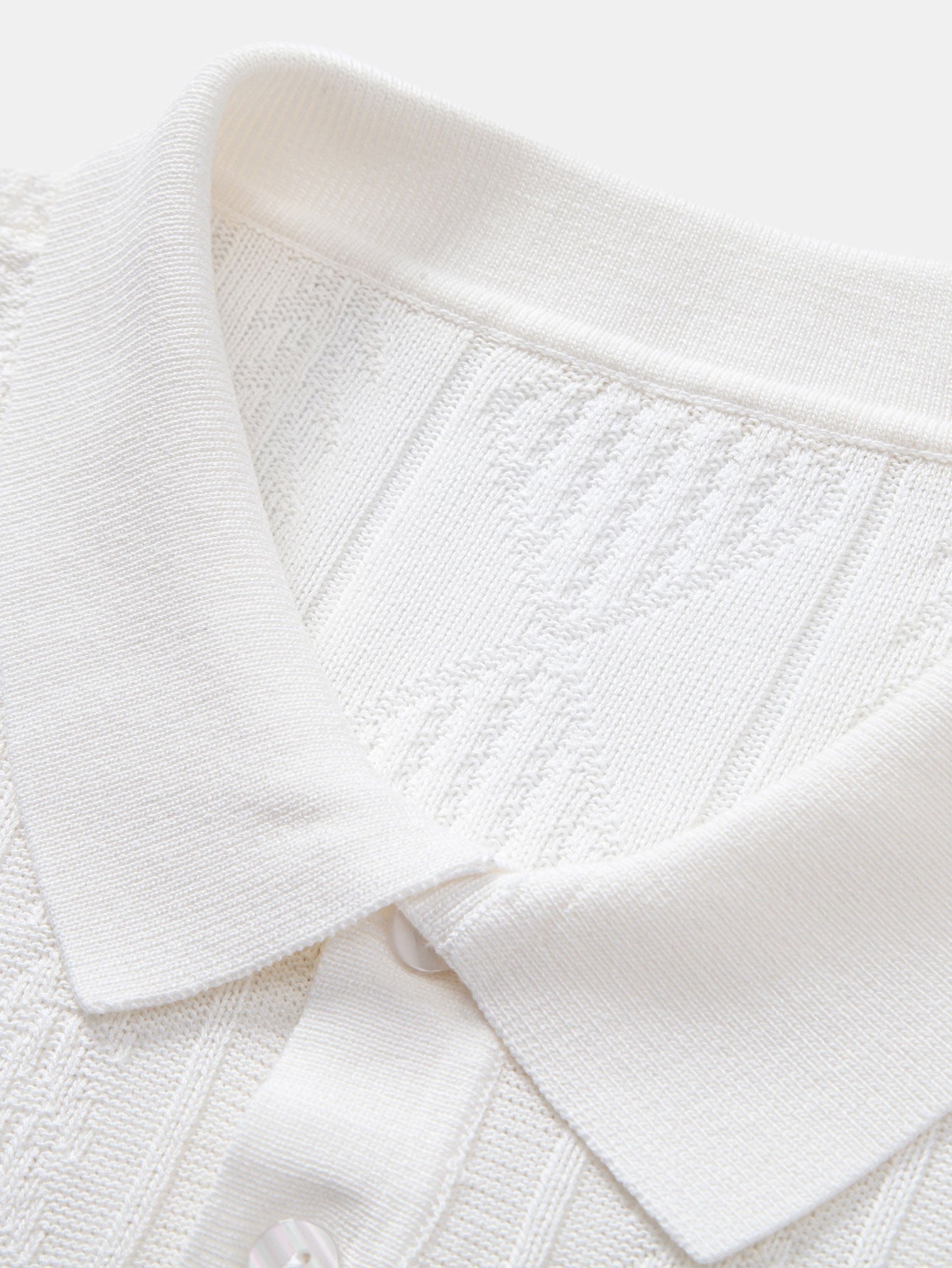 POLO IN JACQUARD GEOMETRICO & PANTALONI SLIM FIT AFFUSOLATI