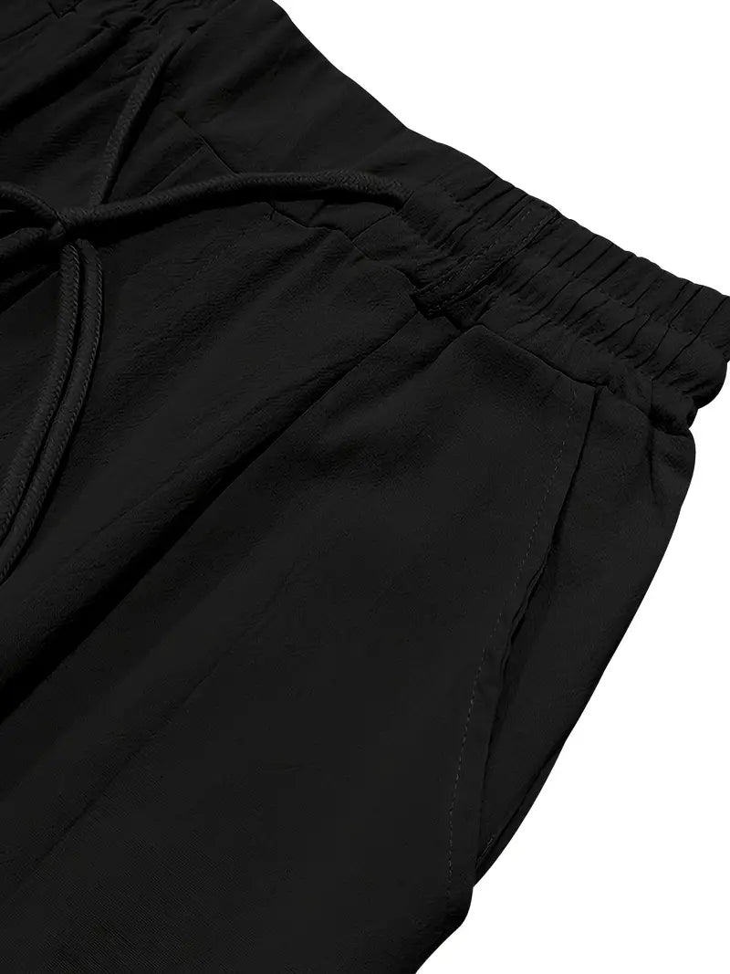 NICHOLS | PANTALONI LARGHI IN LINO CON COULISSE