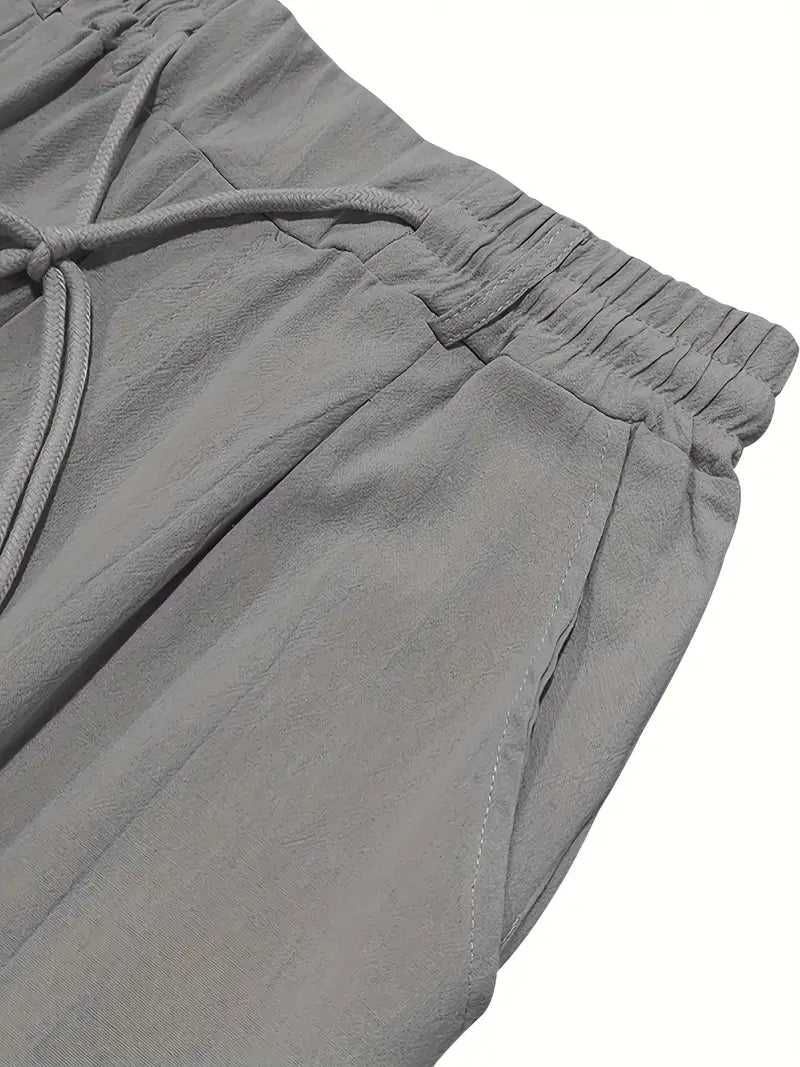 NICHOLS | PANTALONI LARGHI IN LINO CON COULISSE